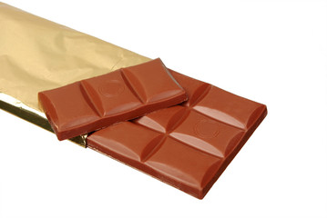 Chocolate bar in foil on a white background
