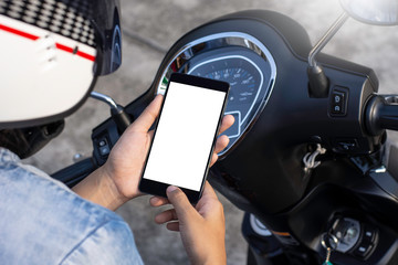 Young woman with helmet hand holding mobile smartphone with blank white screen, search internet...
