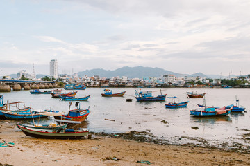 Fototapeta na wymiar Pier with fishing boats. Nha trang