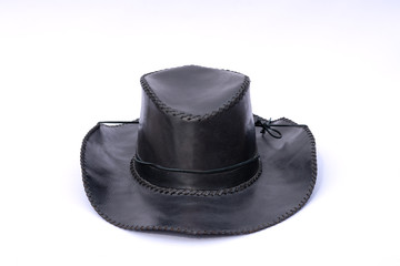 Black leather cowboy hat isolated on white background.