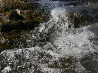 water flowing over rocks