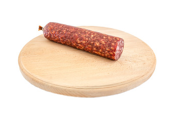 smoked sausage on a wooden board and on a white background