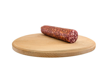 smoked sausage on a wooden board and on a white background
