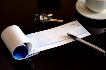  Mockup image of  checkbook,pen,car key and cup of coffee on dark table background at modern...