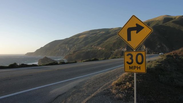 Crane shot of cars on Cabrillo Highway 1 at Big Sur, near Carmel, California, USA