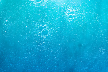 Air bubbles in the water background.Abstract oxygen bubbles in the sea.Circle foamy air in the...