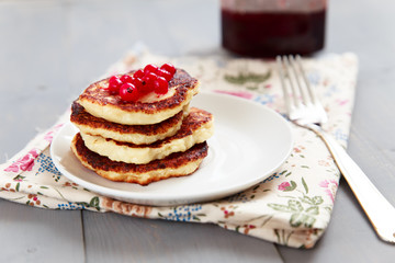 Tasty dessert with jam and berries
