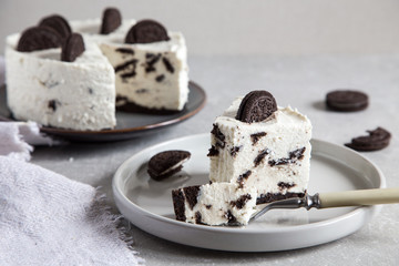 Creamy no bake cheesecake with chocolate cookies. biscuit cake/