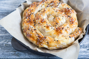 Vertuta, traditional Romanian, Moldavian or Balkan baking pie. Spiral filo pastry pie