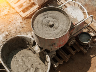 Cement or mortar is inside cement mixer in construction site