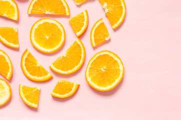 Fruit pattern of fresh orange slices on pastel background. Top view. Copy space. - Image