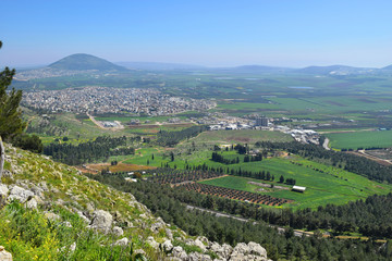 view of the Jezreel Valley, biblical Mount Tabor and the Arab villages at its foot, neighborhood Nazareth, Israel
