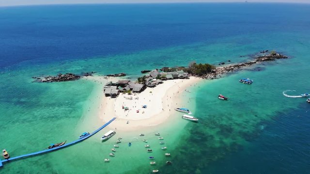 AERIAL. Top view of tropical island with white sandy beach , Khai island, Phuket, Thailand.