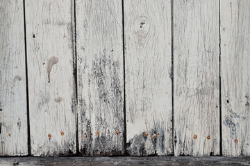 Rustic vertical white boards with rusty nails