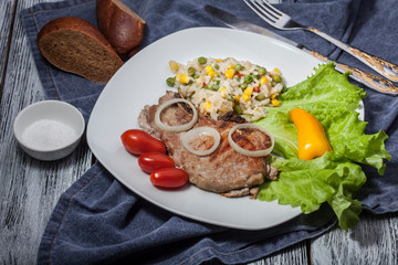 roast pork with rice and vegetable