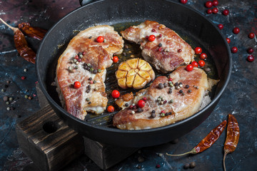 roast pork in a cast iron pan