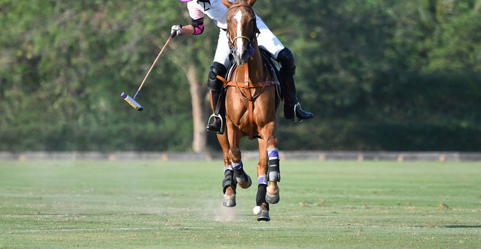Player Riding To Control The Ball.