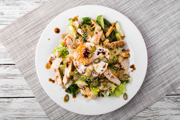 dietary salad with chicken breast, green beans, cucumber and egg