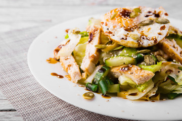 dietary salad with chicken breast, green beans, cucumber and egg