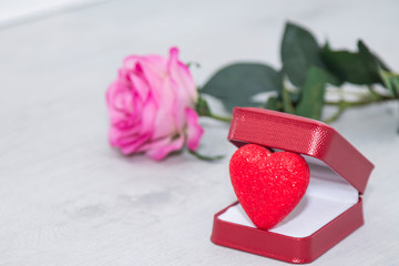 Mother's day card, with a present of heart and roses