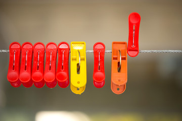 colorful clothing clips on iron sling