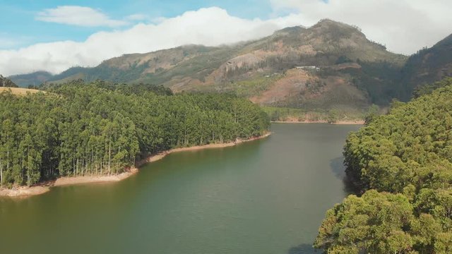 Aerial view beautiful nature with mountains and hills by Lake Mattupetty. Kerala State. Near the city of Munar.