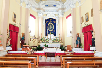 Fototapeta na wymiar Comacchio, Italy. Interiors of catholic church in Comacchio (Chiesetta di San Pietro).
