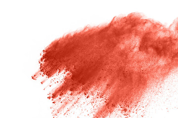 Living coral powder explosion on white background. Colored cloud. Colorful dust explode. Paint Holi.