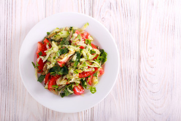 Fresh vegetable salad with cucumber, tomato