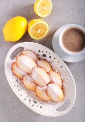 Lemon madeleines with icing sugar