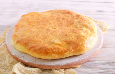 Savory pie with cheese and spring onions