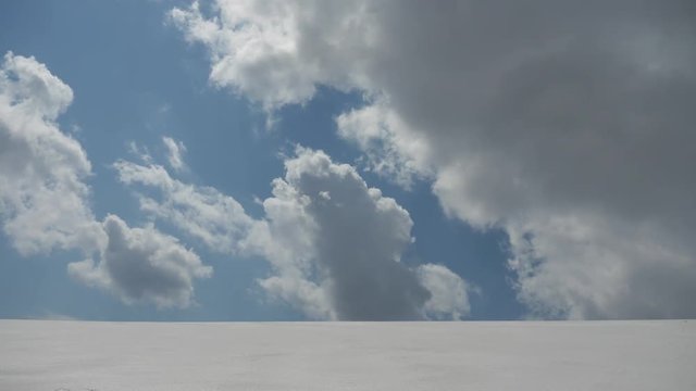 Snow field and blue sky