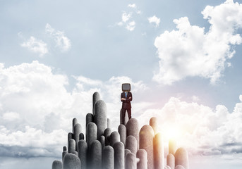 Businessman with an old TV instead of head.