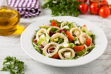 Salad with squid rings.