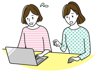 パソコンをする中年女性