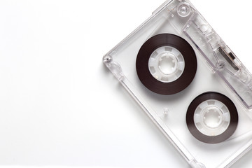 Naklejka premium Transparent audio cassette on white background