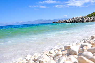 Sea Foam on Beach Sand