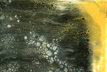 Very beautiful texture background. Black paint flows in gold with the addition of white paint. Style includes curls of marble or agate with bubbles and cells. Natural style.  Contemporary art. 