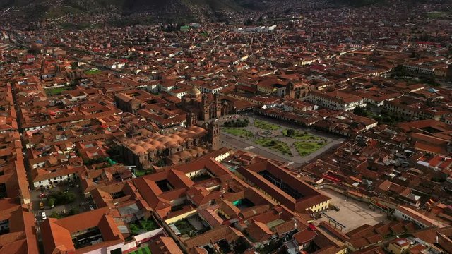 Aerial drone view of the main square of Cusco town - Plaza de Armas. Peru, South America.
