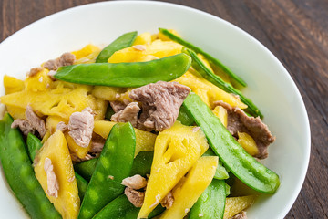 Sweet and sour delicious pineapple peas fried meat