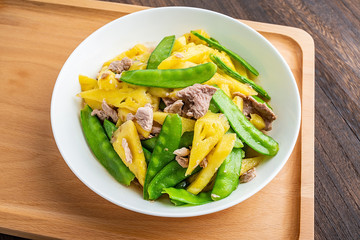 Sweet and sour delicious pineapple peas fried meat