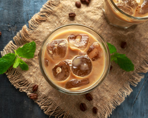 iced latte coffee in a glass with cold milk. Summer drink