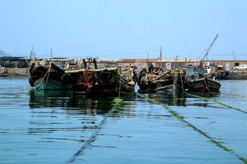 fishing boats on sea beach in China