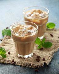 iced latte coffee in a glass with cold milk. Summer drink