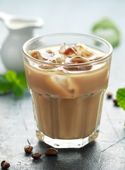 iced latte coffee in a glass with cold milk. Summer drink