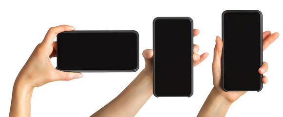 Obraz na płótnie Canvas Set of women's hands showing black smartphone, concept of taking photo or selfie