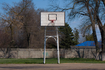 rural old asphalted basketball court