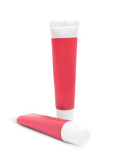 Tubes of cream on white.