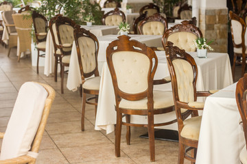 tables and chairs in restaurant