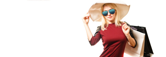 Woman in red dres after shopping isolated on white